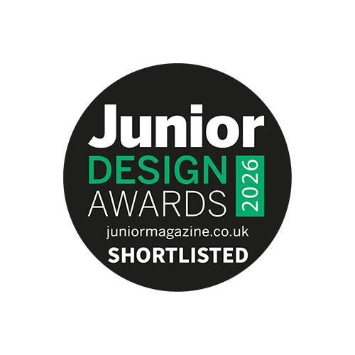 Black circle award logo for Shortlisted for Junior Design Awards 2026