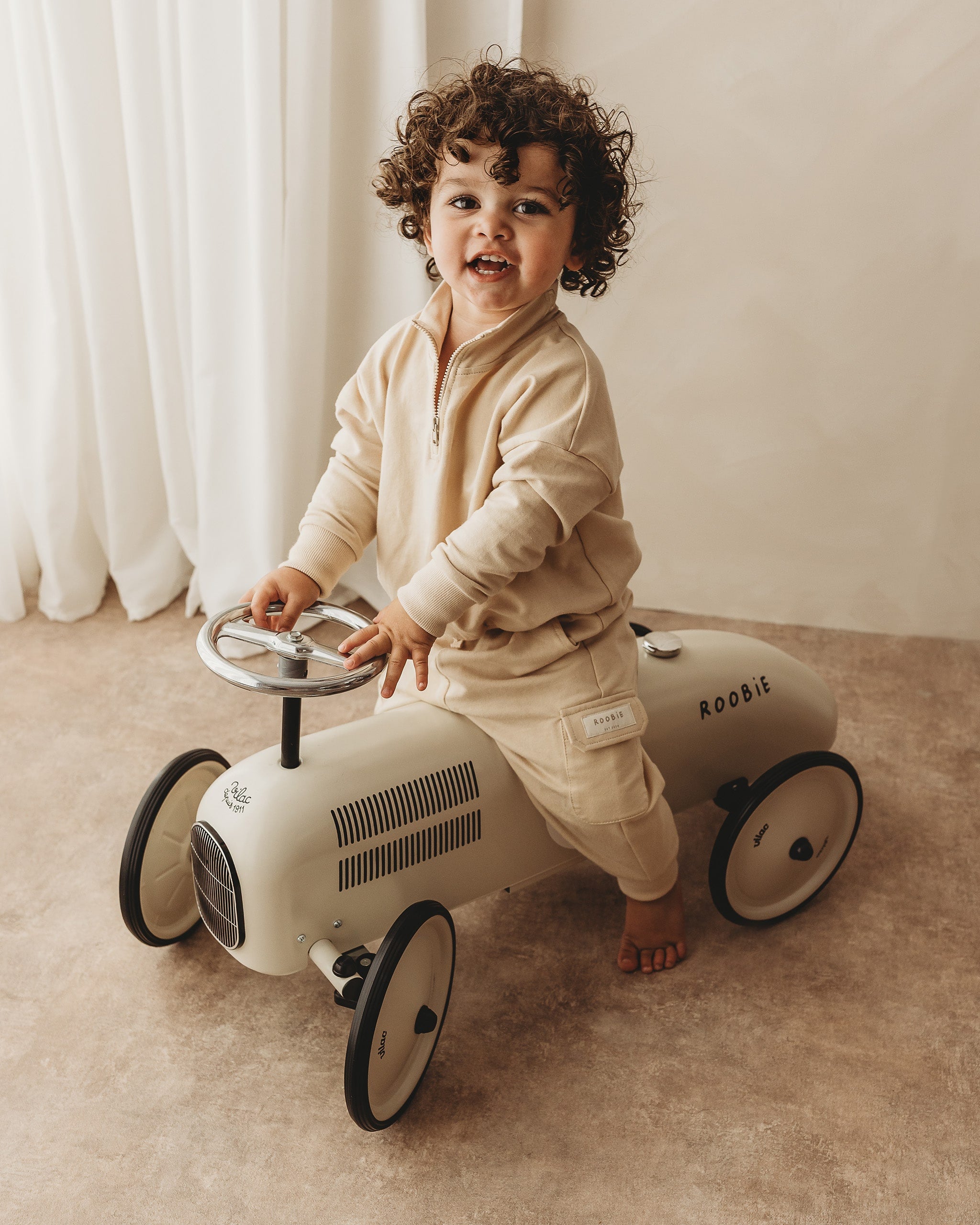 ROOBiE toddler cargo joggers in MACADAMiA MiLK – beige jogger trousers with pockets, nursery-friendly capsule wardrobe basic