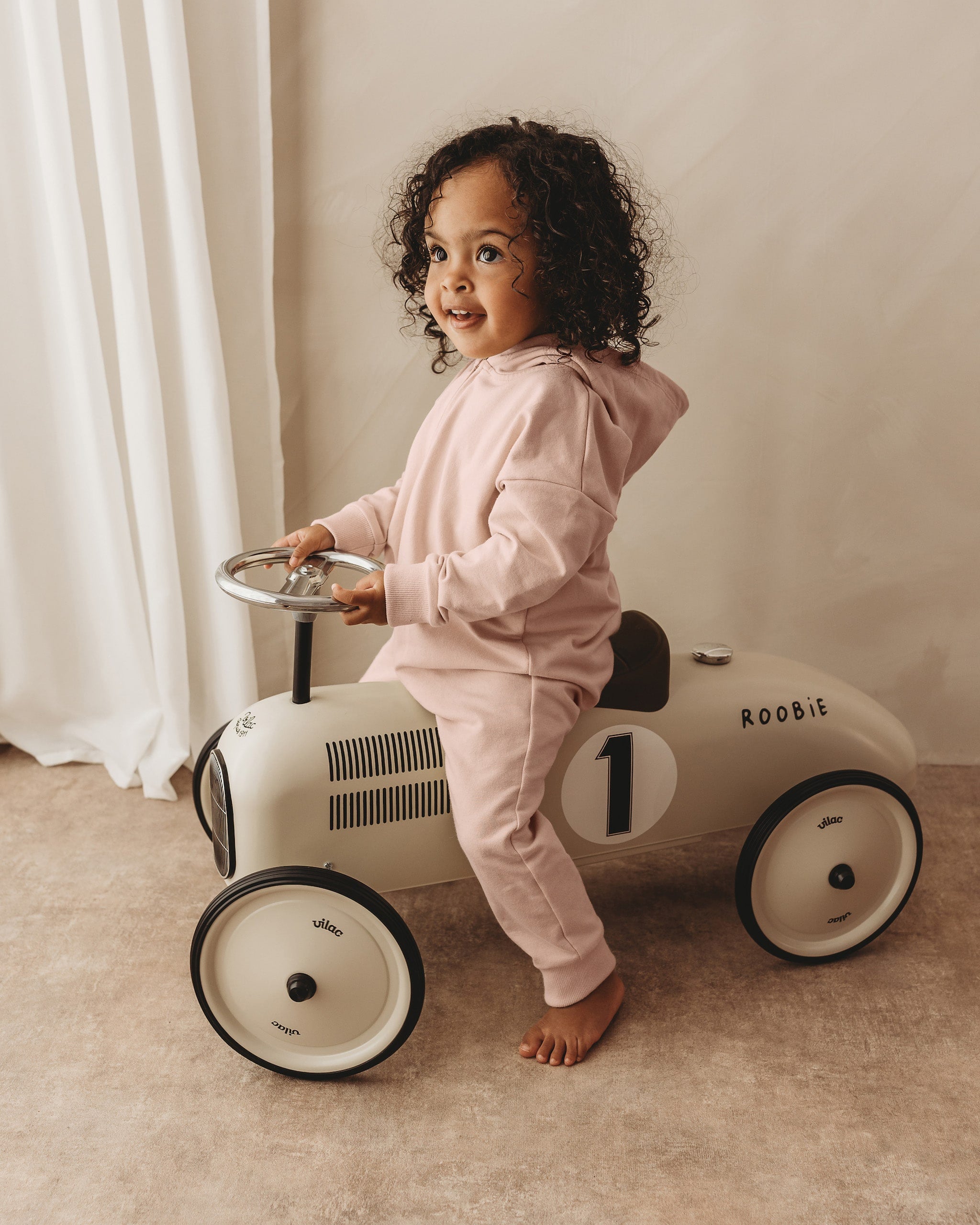 ROOBiE toddler jumpsuit in RASPBERRY WHiP – pink hooded one-piece, easy mix-and-match outfit