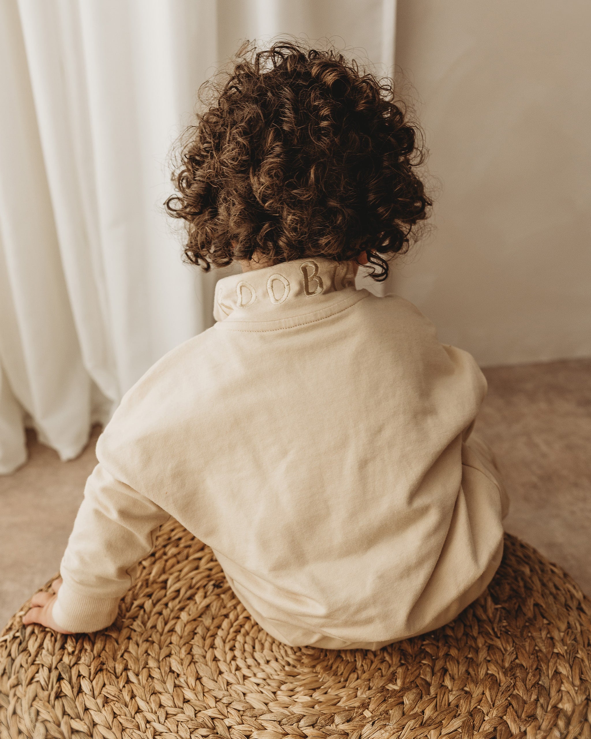 ROOBiE toddler quarter zip in MACADAMiA MiLK – beige half-zip sweatshirt, nursery-friendly capsule layer