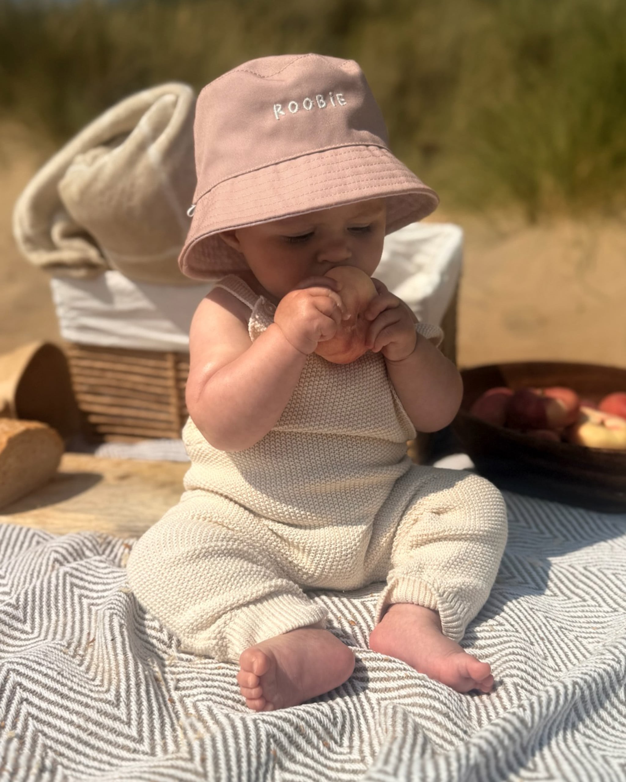 ROOBiE reversible toddler bucket hat in RASPBERRY WHiP – pink 2-in-1 toddler summer hat with removable straps, capsule wardrobe accessory