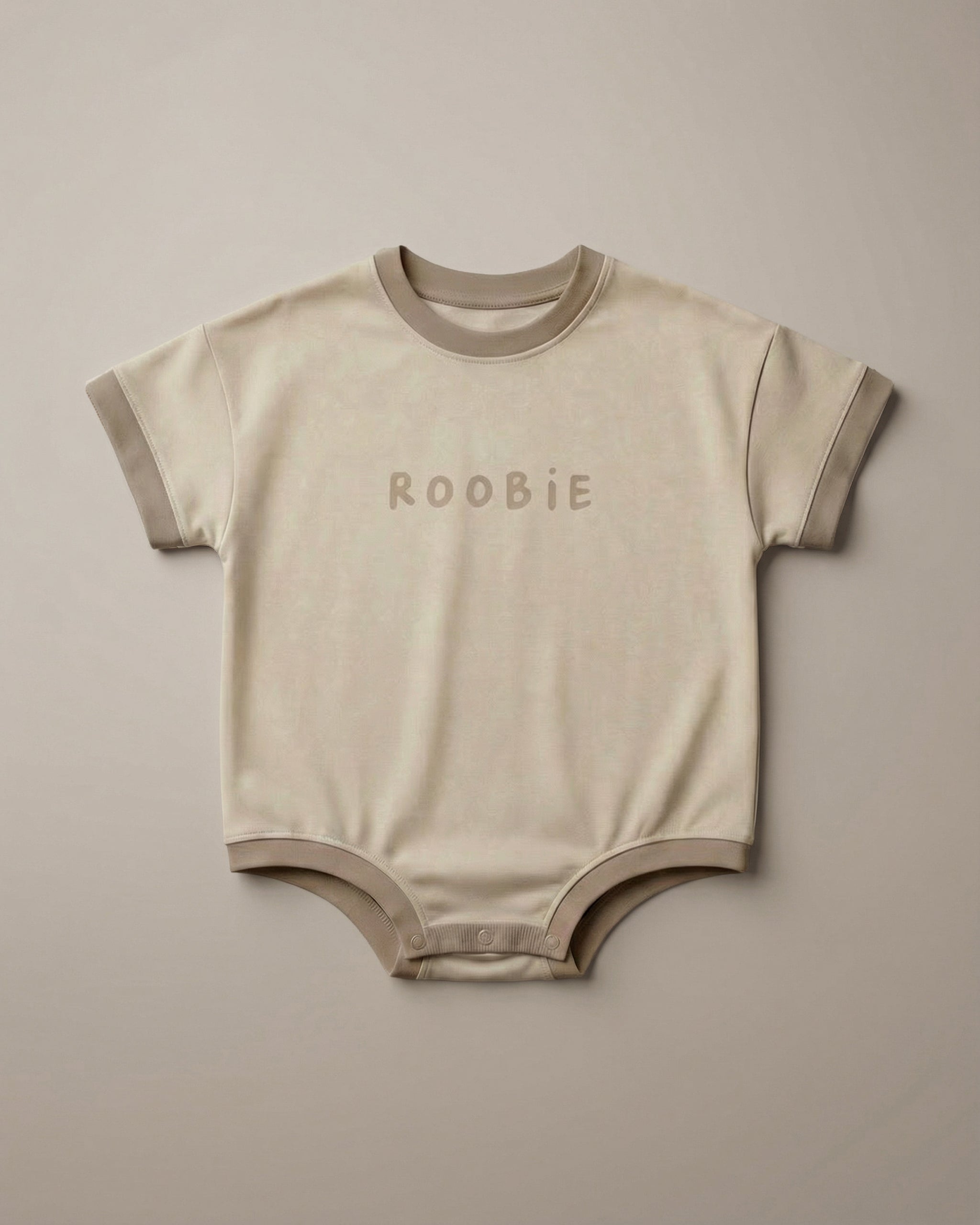 SHORT SLEEVE ROMPER - MACADAMiA MiLK