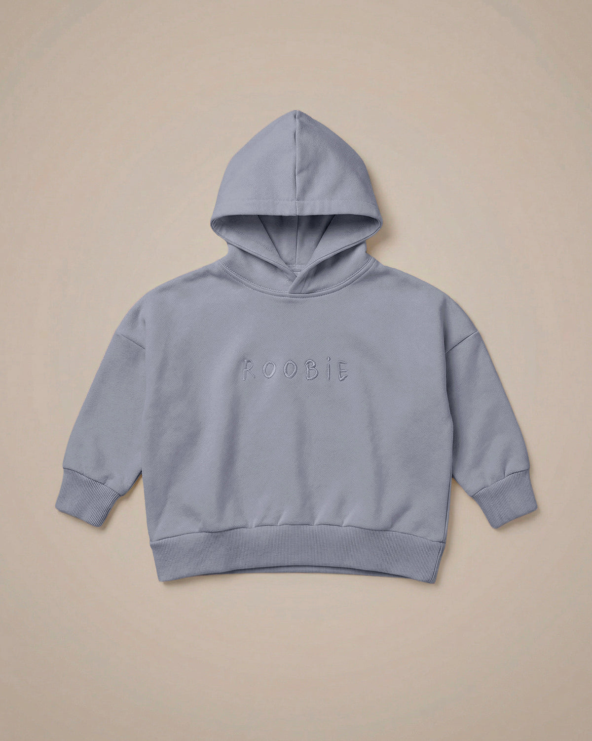 ROOBiE hoodie in light blue, with oversized fit, hooded neckline and long sleeves.
