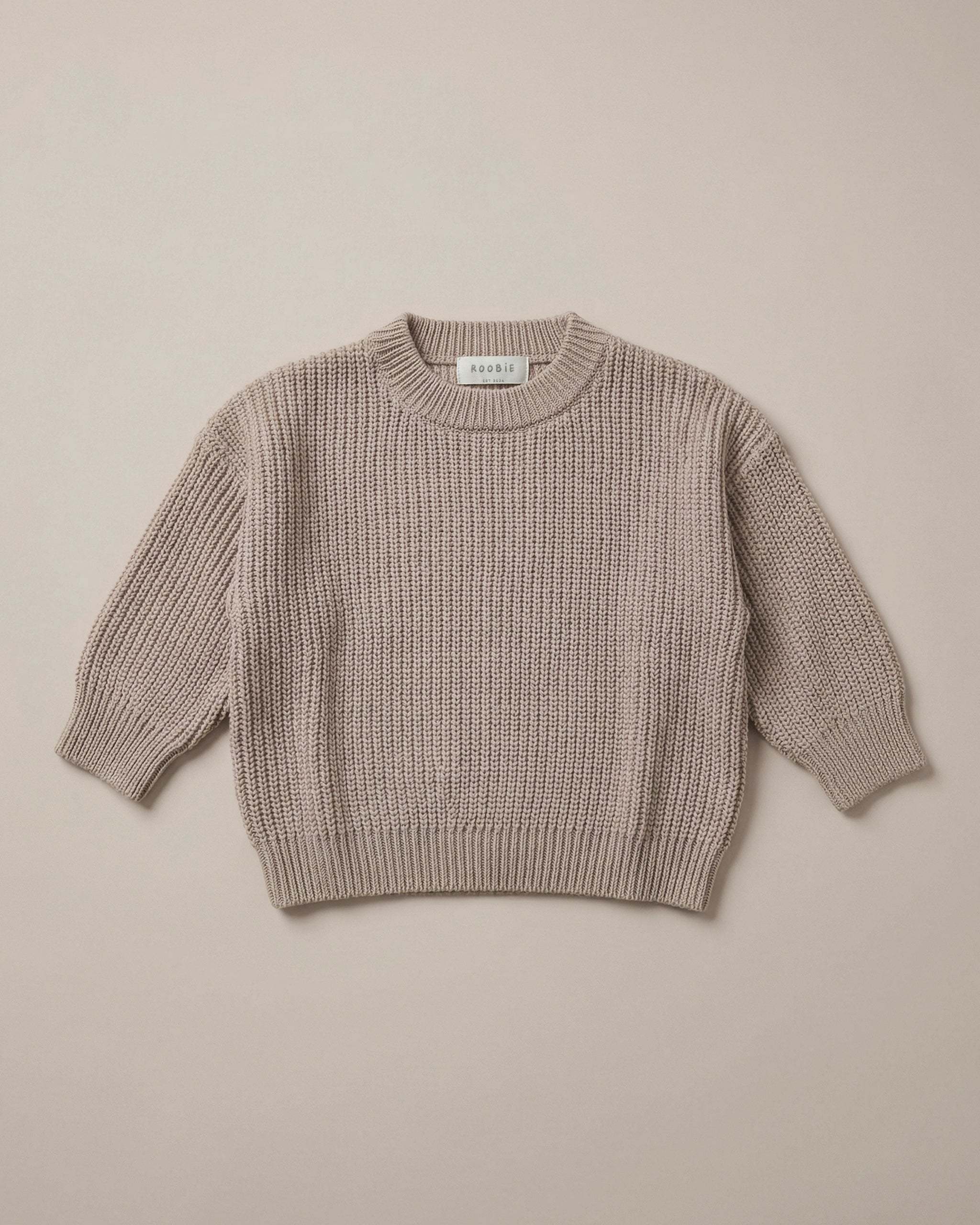 ROOBiE 100% cotton chunky knit sweater in warm brown, with oversized fit, soft fabric and minimal design.