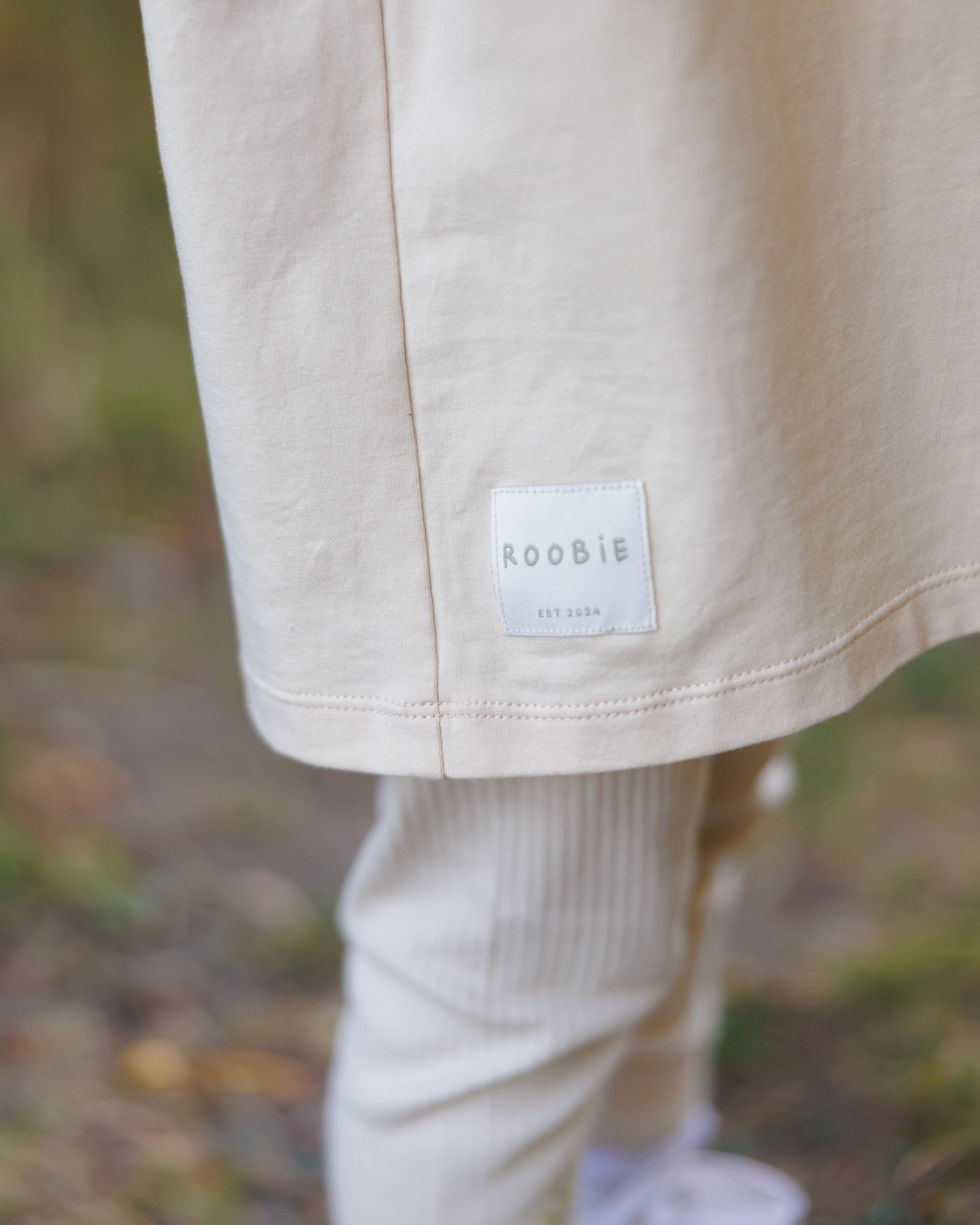 ROOBiE toddler long sleeve tee in MACADAMiA MiLK – beige ribbed crew neck top, nursery-friendly capsule wardrobe essential