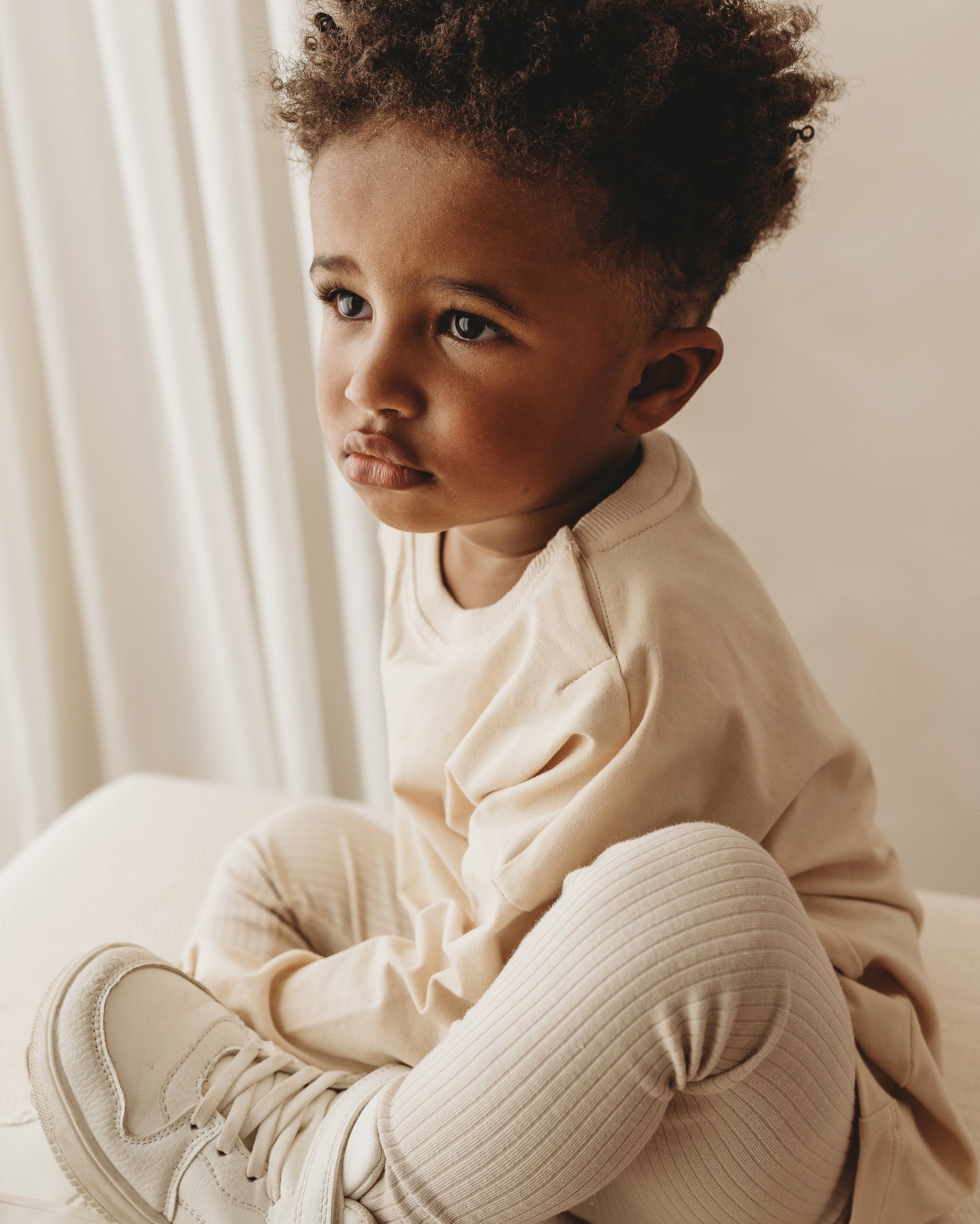 ROOBiE toddler long sleeve tee in MACADAMiA MiLK – beige ribbed crew neck top, nursery-friendly capsule wardrobe essential
