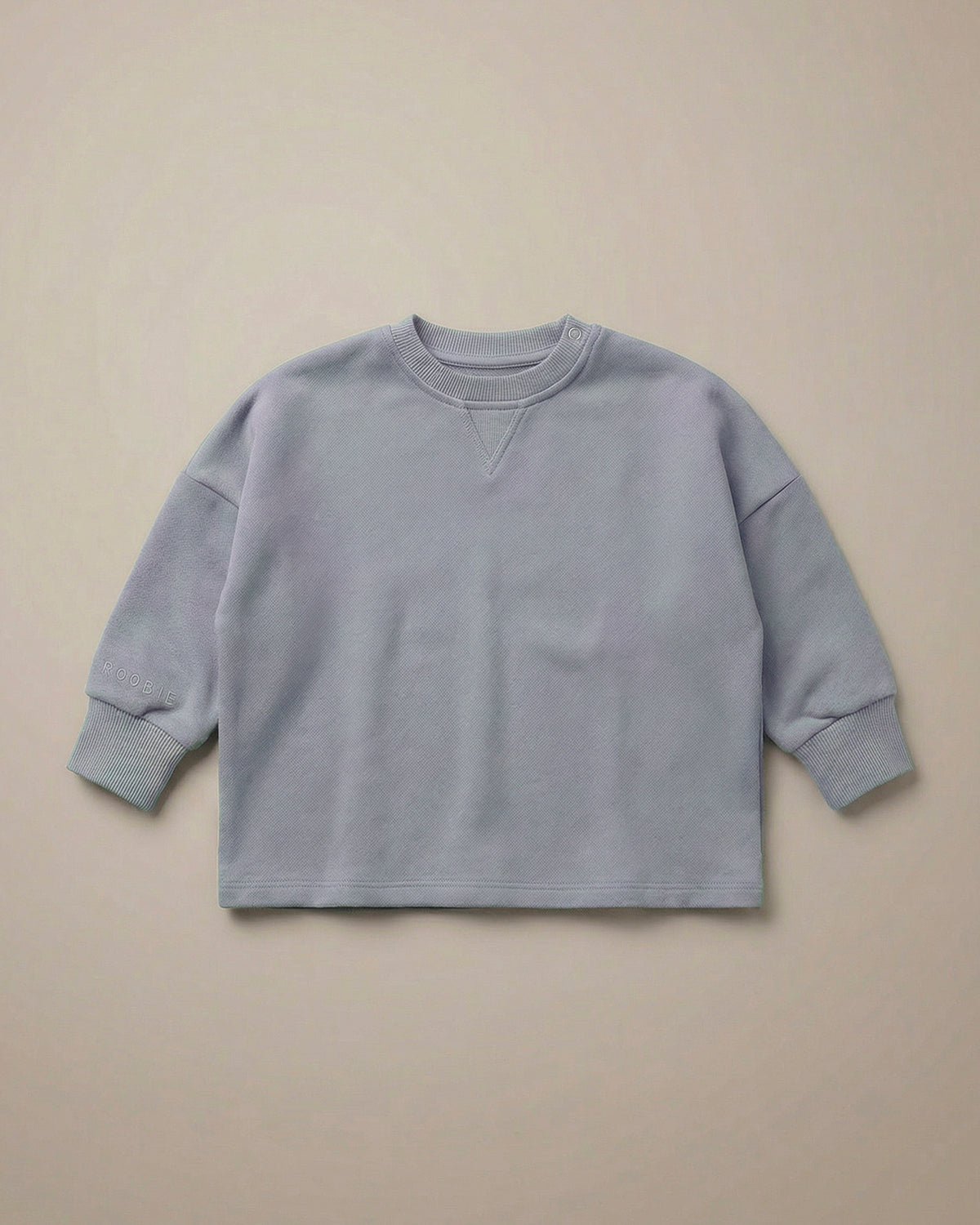 ROOBiE jumper in light blue, with oversized fit, soft fabric and minimal design.